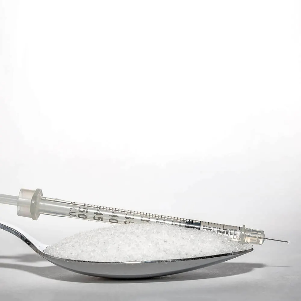 Diabetes, açúcar e injecção de insulina.